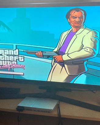 PlayStation 2 (PS2) Slim Silver + lotto 24 giochi