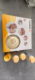 Tiralatte Medela con accessori