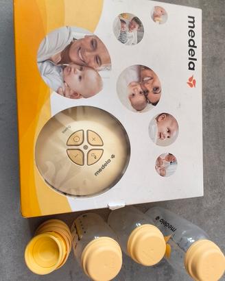 Tiralatte Medela con accessori