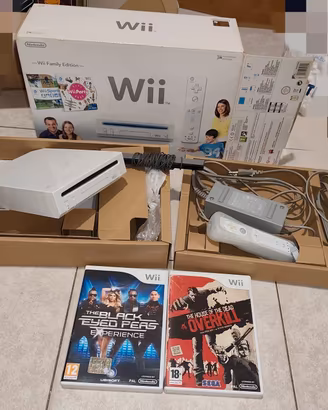 Wii con scatola e giochi 