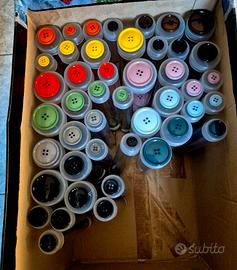 Bottoni in poliestere tinta unita