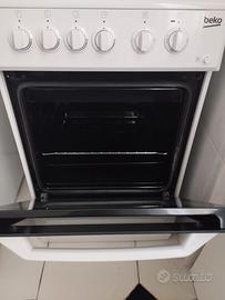 Cucina a gas con forno elettrico Beko