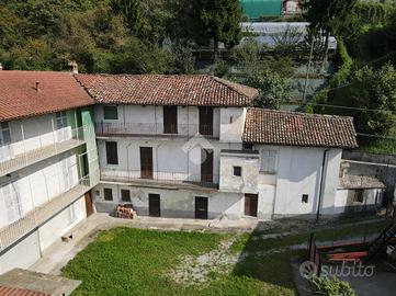 CASA SEMINDIPENDENTE A CALOLZIOCORTE