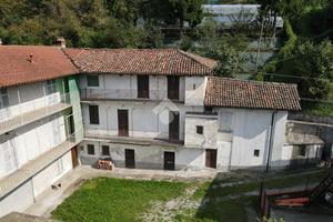 CASA SEMINDIPENDENTE A CALOLZIOCORTE