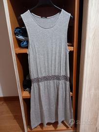 vestito/copricostume