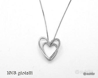 Collana comete con cuore di diamanti