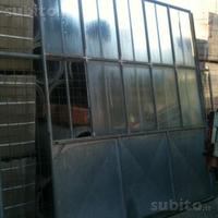 Porta scorrevole in ferro zincata con vetri