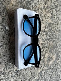 Moscot neri con lenti blu