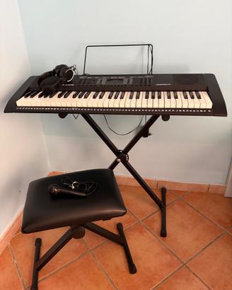 Pianola con supporto, cuffie e microfono