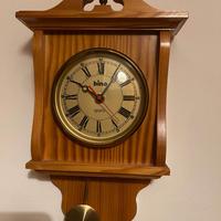 Piccolo pendolo in legno al quarzo Bino vintage