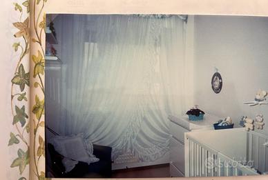 Tende doppie a incrocio bianche