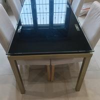 Tavolo in cristallo con prolunga