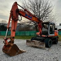 Escavatore gommato FH EX135W