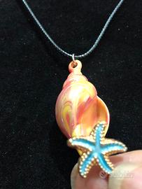 Pendente a forma di conchiglia + 🎁