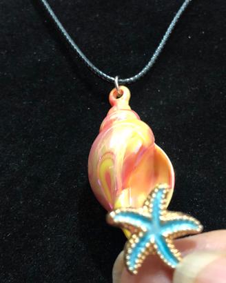 Pendente a forma di conchiglia + 🎁