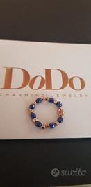 Anello oro rosa e ceramica blu dodo