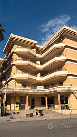 Appartamento con veranda e posto auto