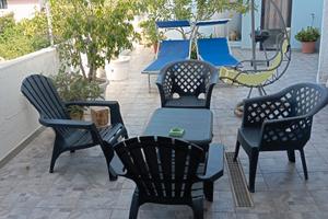 Trilocale con veranda coperta e cortile interni