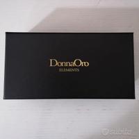 Bracciale DonnaOro, in oro argento e pietre prez..