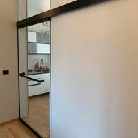 Porta scorrevole in vetro