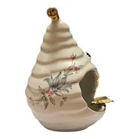 Posacenere in ceramica con decorazioni dorate