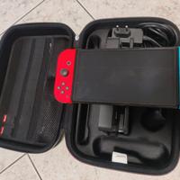 Nintendo switch OLED (blu neon/rosso) con 3 giochi