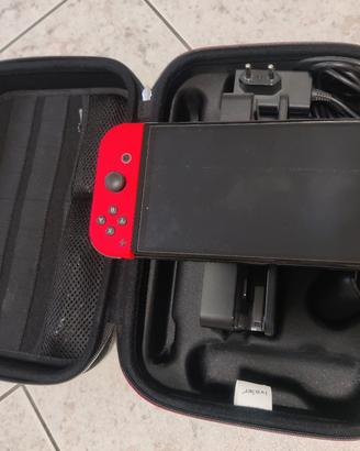 Nintendo switch OLED (blu neon/rosso) con 3 giochi