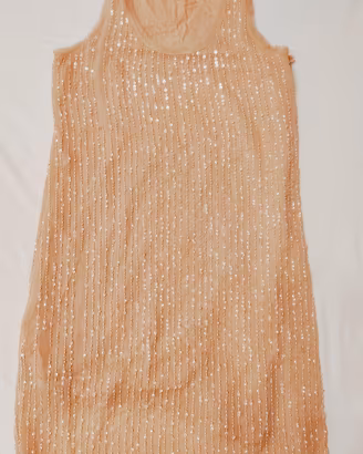 Vestito motivi con paillettes 