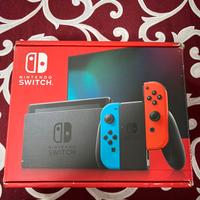 Nintendo switch con scatola e gioco Mario party 