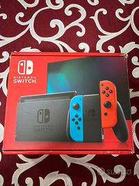 Nintendo switch con scatola e gioco Mario party 