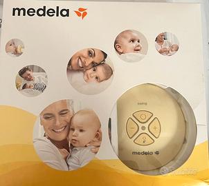 Tiralatte Medela Swing e bustine conservazione
