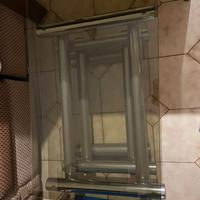 Tavolino da salotto in vetro e metallo