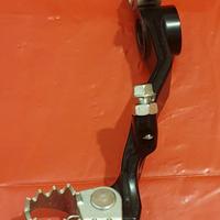 Pedale freno post.+ guarnizione carter + pignone 