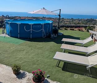 Casa con piscina riscaldata panoramica