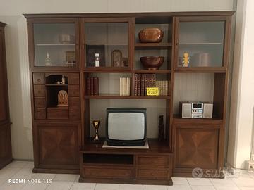 Parete libreria massello.Noce finitura cera 