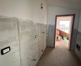 Appartamento su due livelli in piccolo stabile