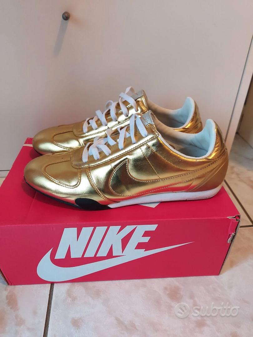 Scarpe nike dorate hotsell