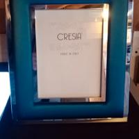 Cornice CRESIA in acciaio e raso 