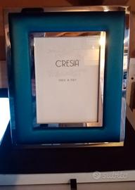 Cornice CRESIA in acciaio e raso 
