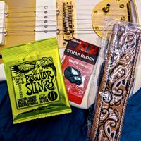 Corde chitarra Ernie Ball, Cinghia e Strap Lock