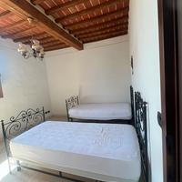 Coppia di letti da 1 piazza in ferro battuto