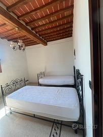 Coppia di letti da 1 piazza in ferro battuto