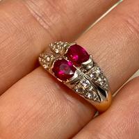 Anello in oro giallo e bianco con zirconi e pietre