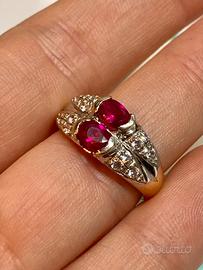 Anello in oro giallo e bianco con zirconi e pietre