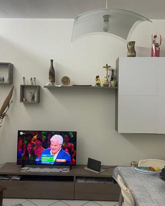 Parete attrezzata più altro