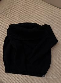 maglione nero a spalle scoperte
