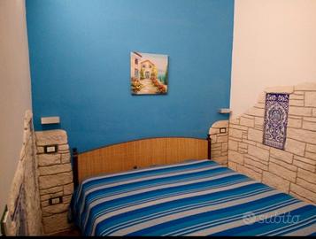 Camera da letto in rattan
