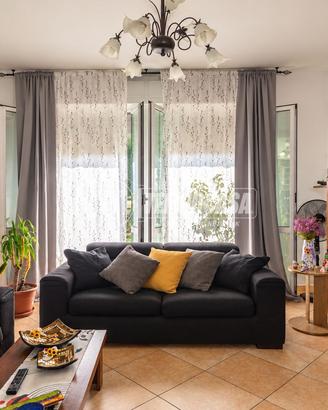 AMPIO TRILOCALE CON BALCONE E GARAGE