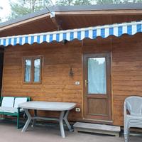 Roulotte stanziale con pre ingresso in legno