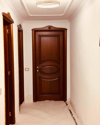 Porte  in legno massello  noce scuro